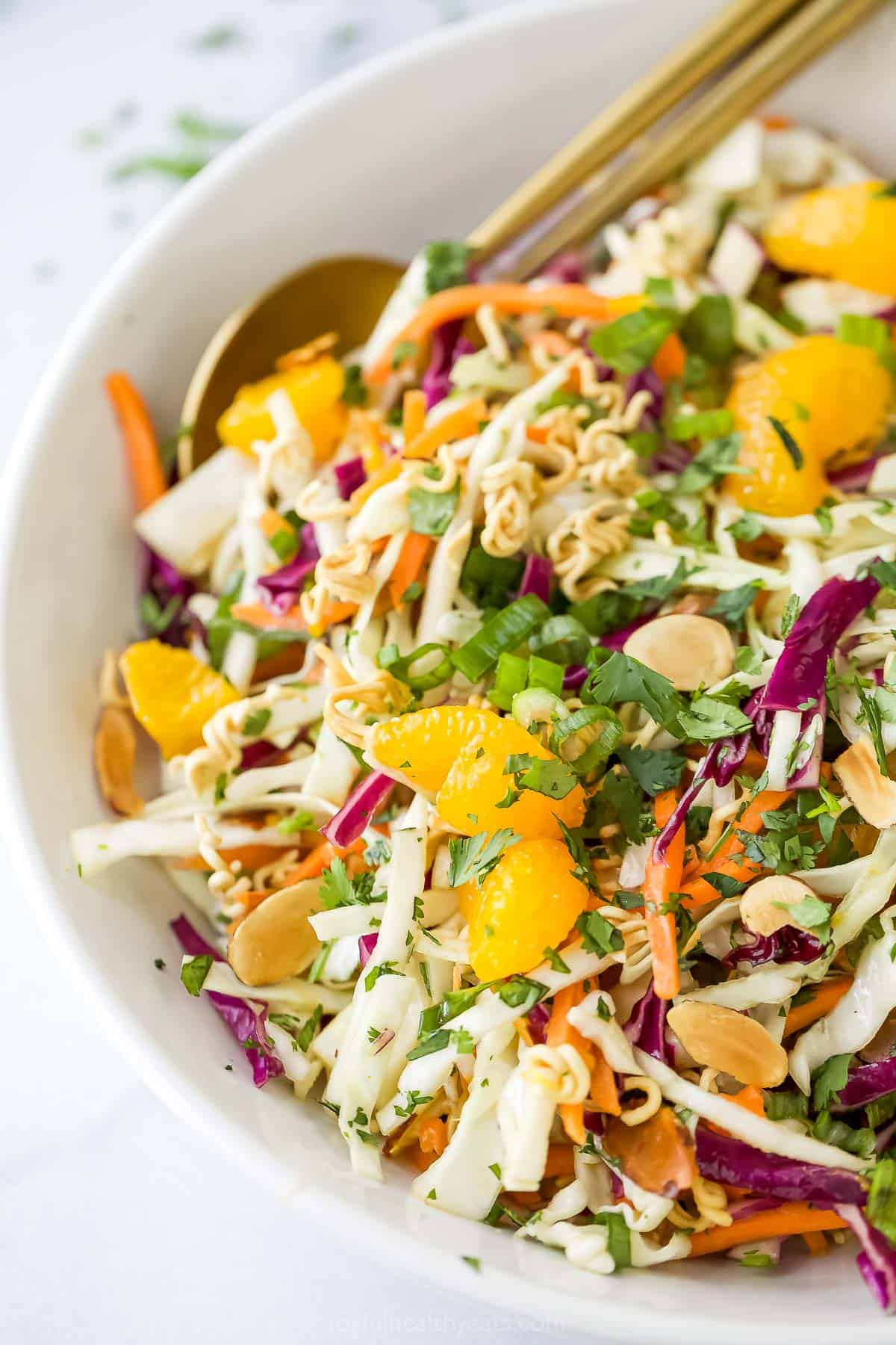 Crunchy, crisp, and sweet Ramen Noodle Salad is a classic! I’ve given it a more modern spin, but it still has that familiar flavor you love. Bowl of ramen noodle salad