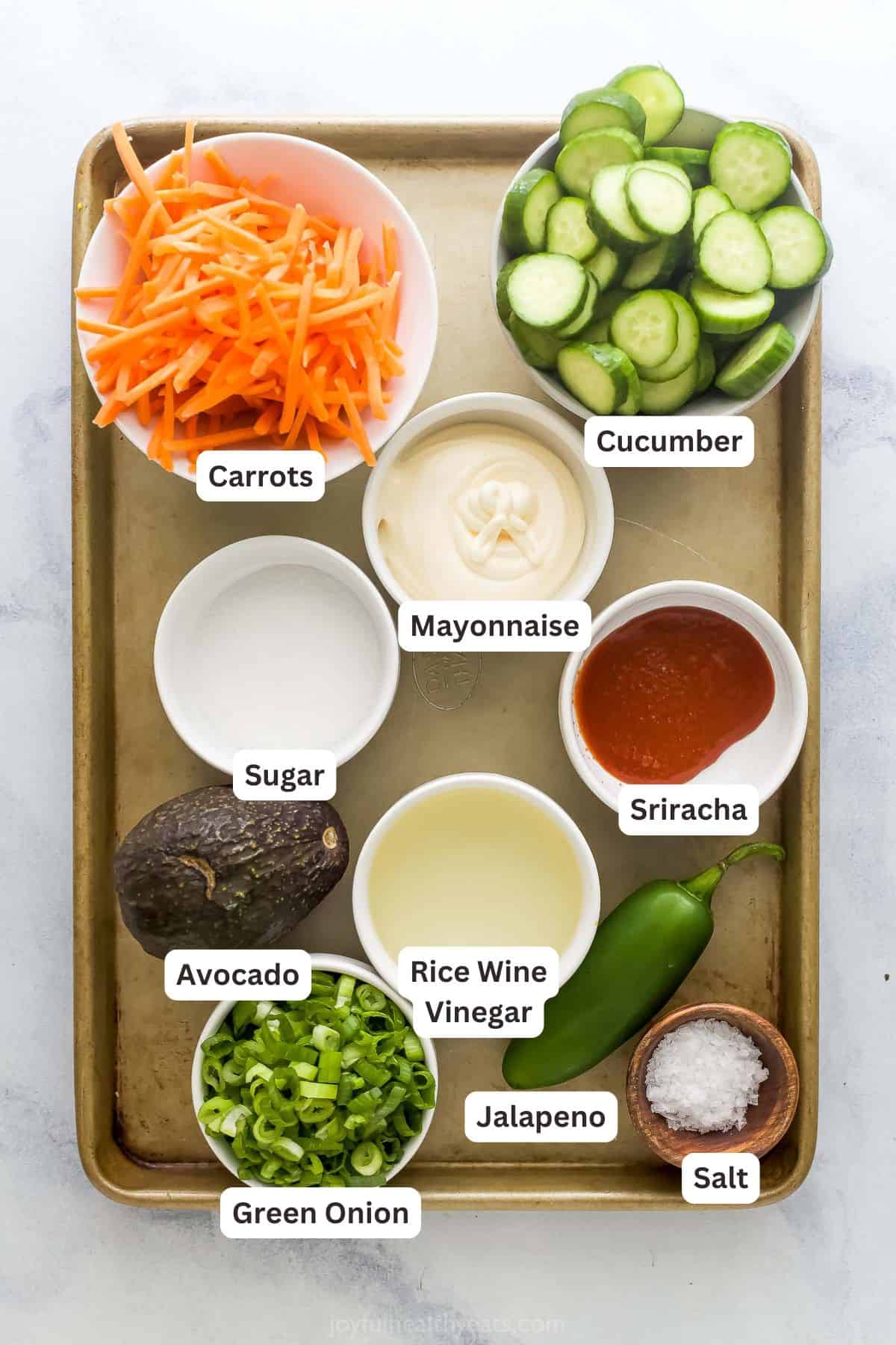 Overhead view of ingredients for banh mi bowls