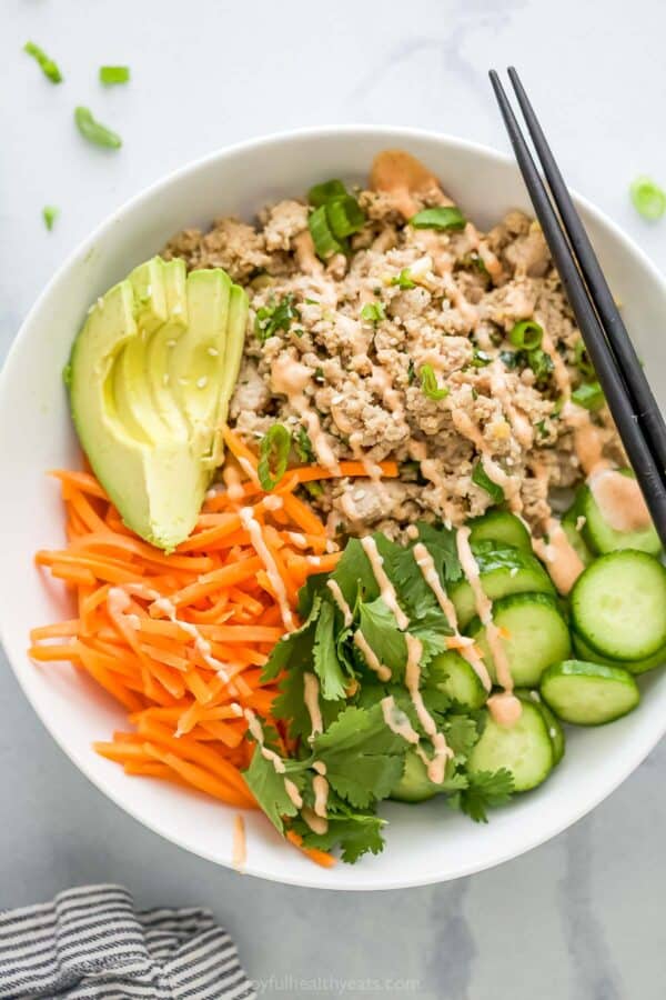 Overhead view of banh mi bowl with chopsticks
