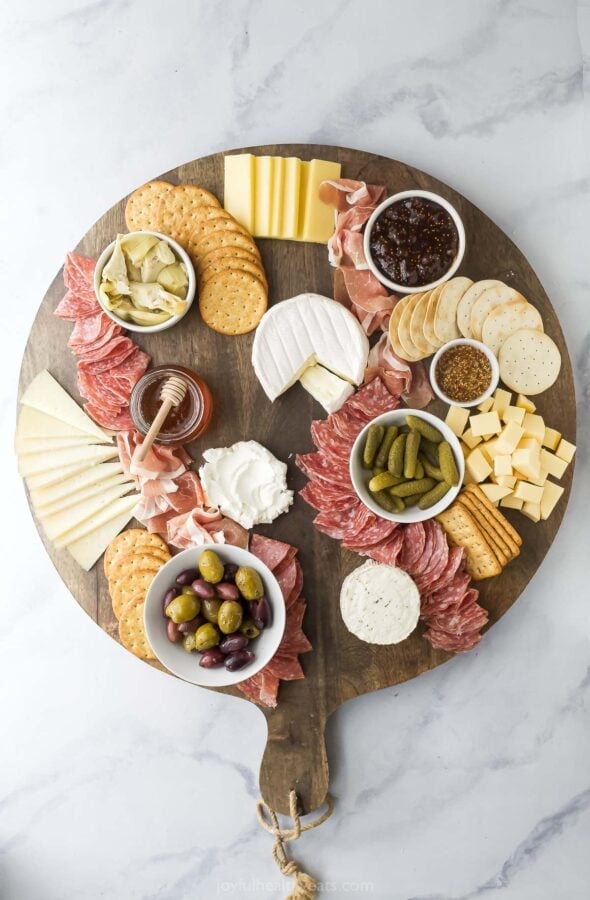 Overhead view of charcuterie board before adding fruit
