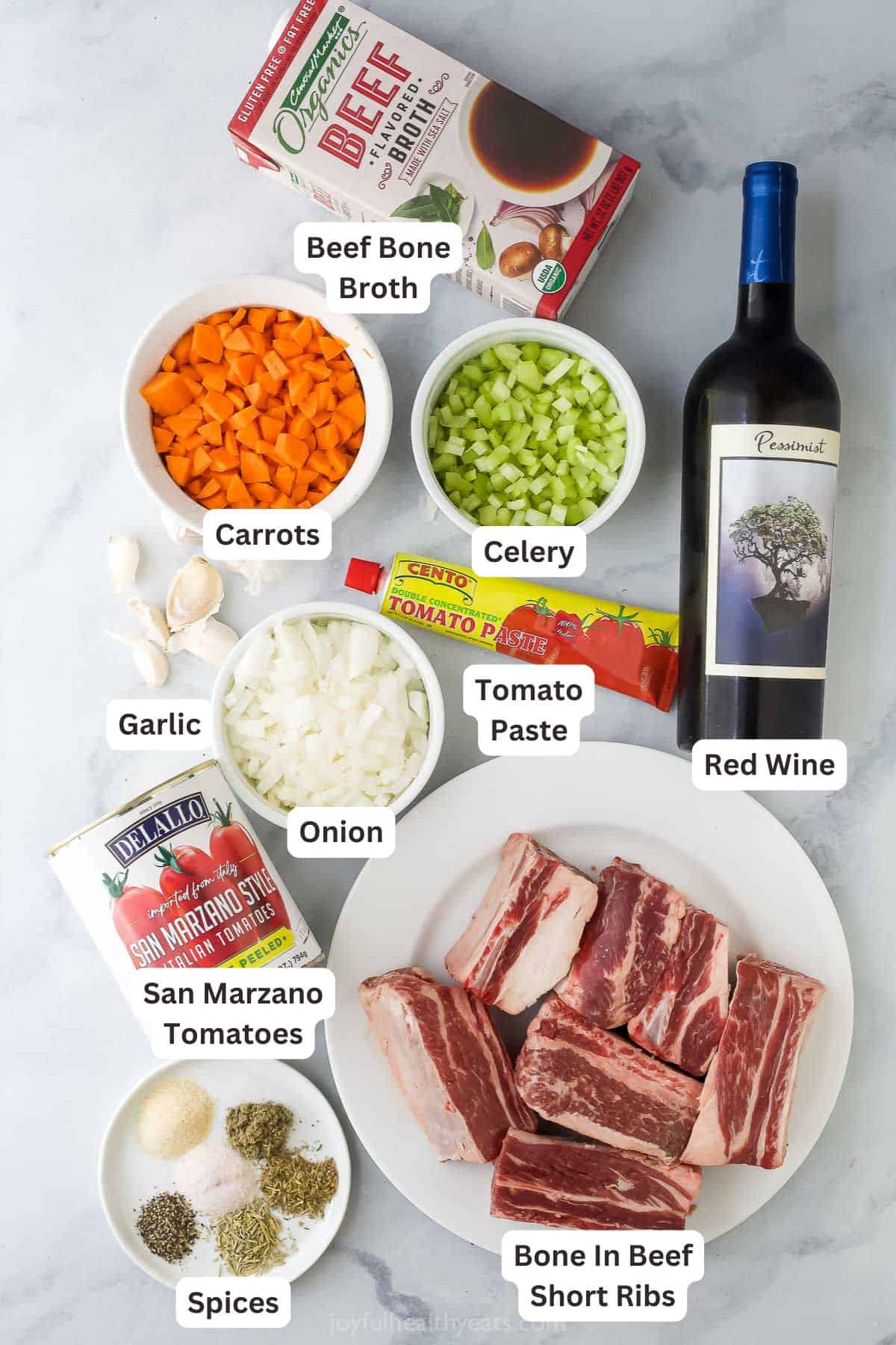Overhead view of ingredients for braised short rib ragu