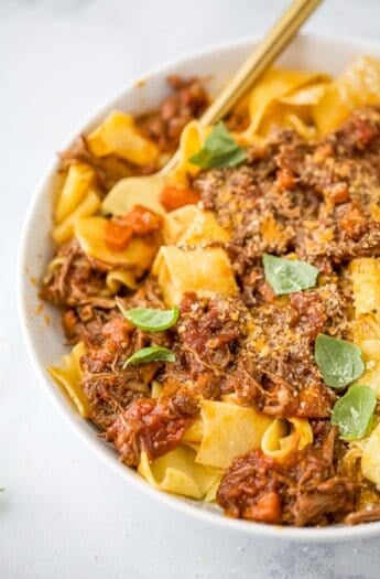 Braised short rib ragu in bowl with pappardelle