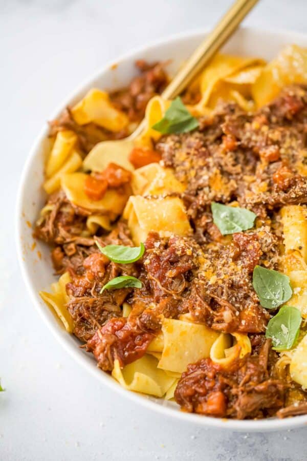 Braised short rib ragu in bowl with pappardelle
