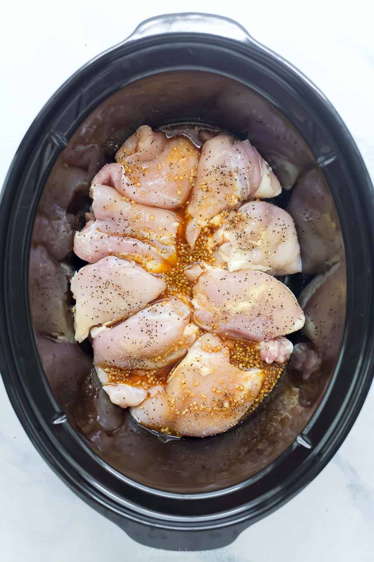 Chicken thighs in slow cooker with honey garlic sauce