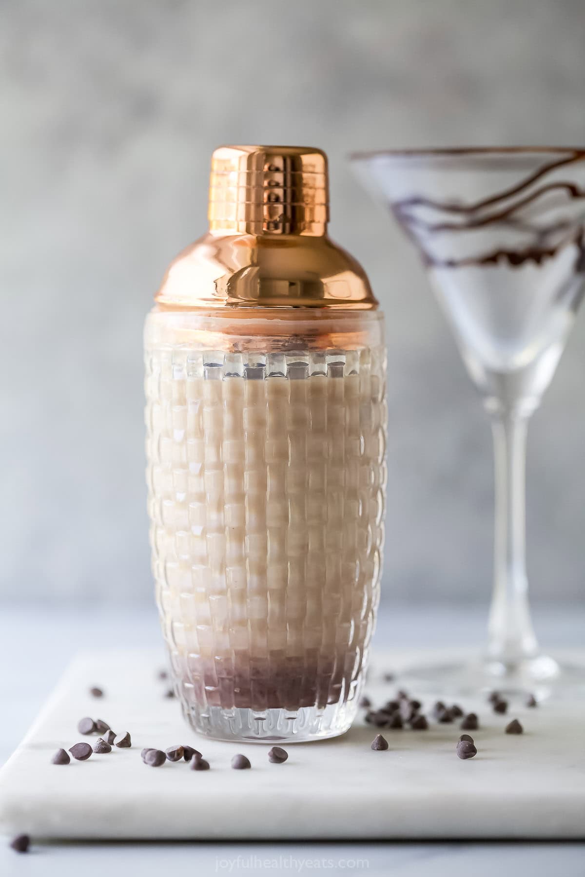 Ingredients for chocolate martini in shaker.