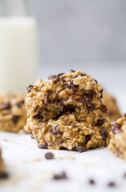 Two stacked banana oatmeal cookies with chocolate chips.