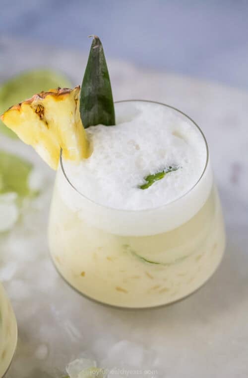 Coconut and pineapple mocktail in glass.