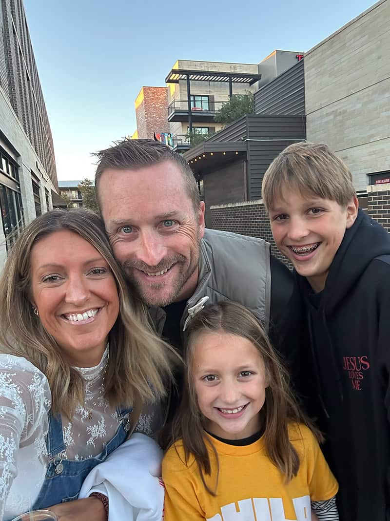 Krista Rollins with her husband and two children.