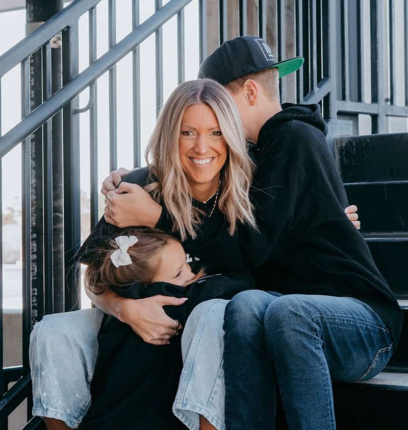 Krista Rollins with her son and daughter.