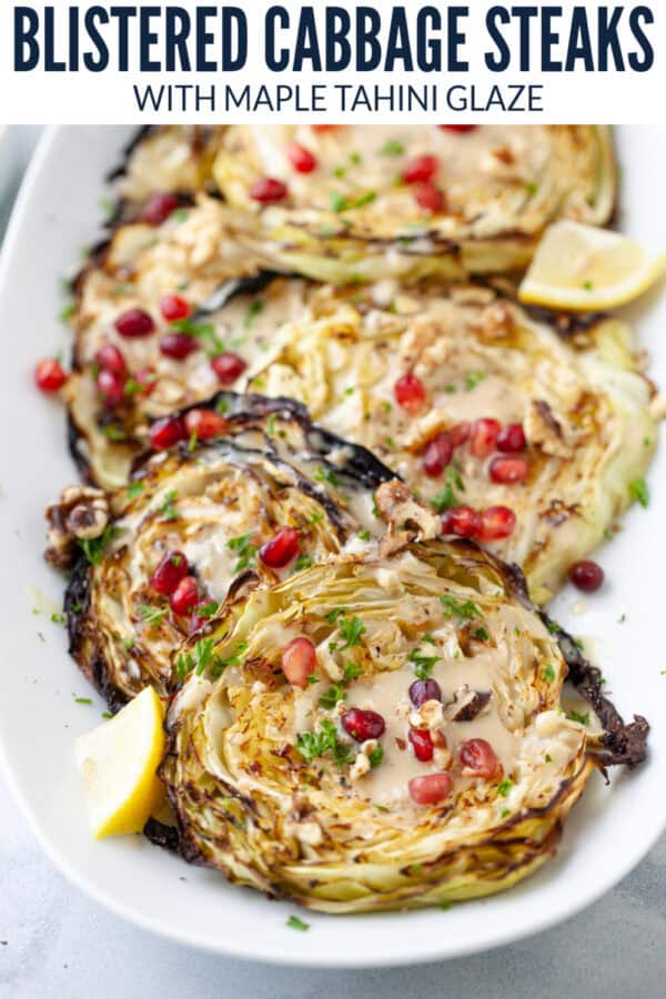 pinterest image for Blistered Cabbage Steaks with Maple Tahini and Pomegranate