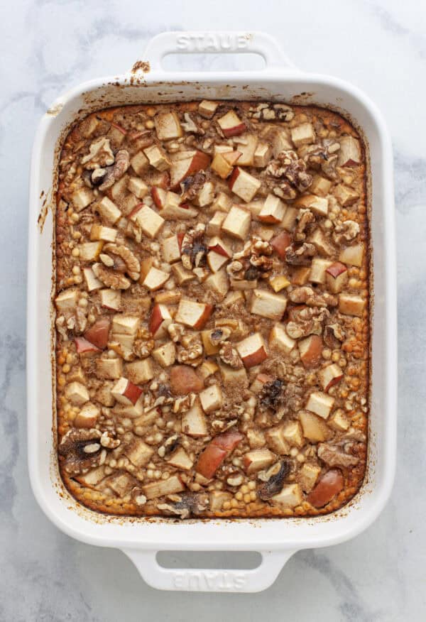Cinnamon baked apple oatmeal in baking dish.