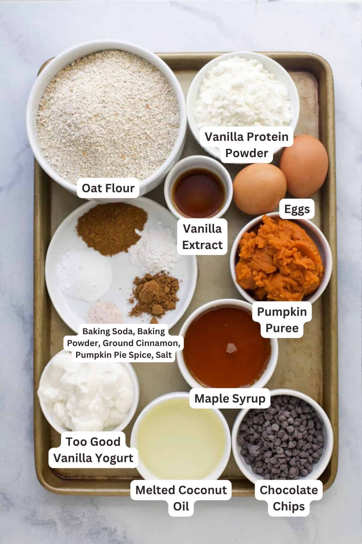 Ingredients for pumpkin protein muffins with labels.